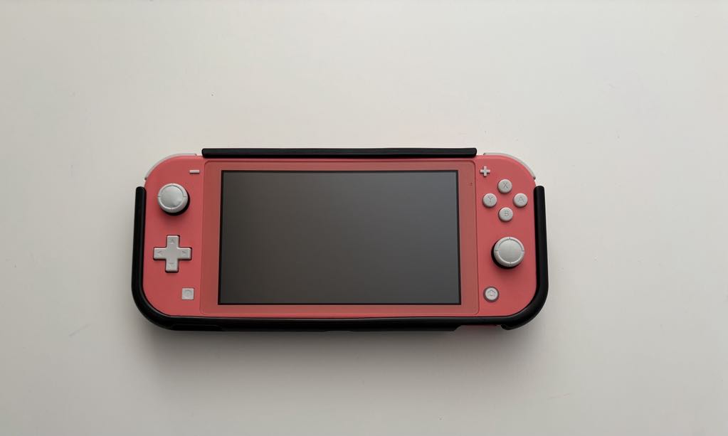 Nintendo Switch Lite 32GB Console - Pink with Black cover